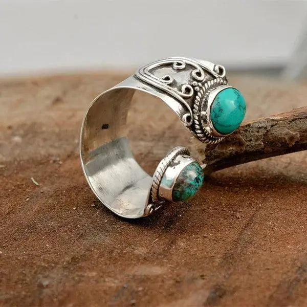 Adjustable ring with double turquoise setting