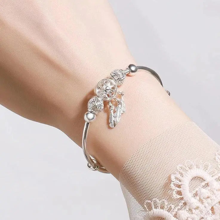 Adjustable bracelet with triple leaf charms sterling silver