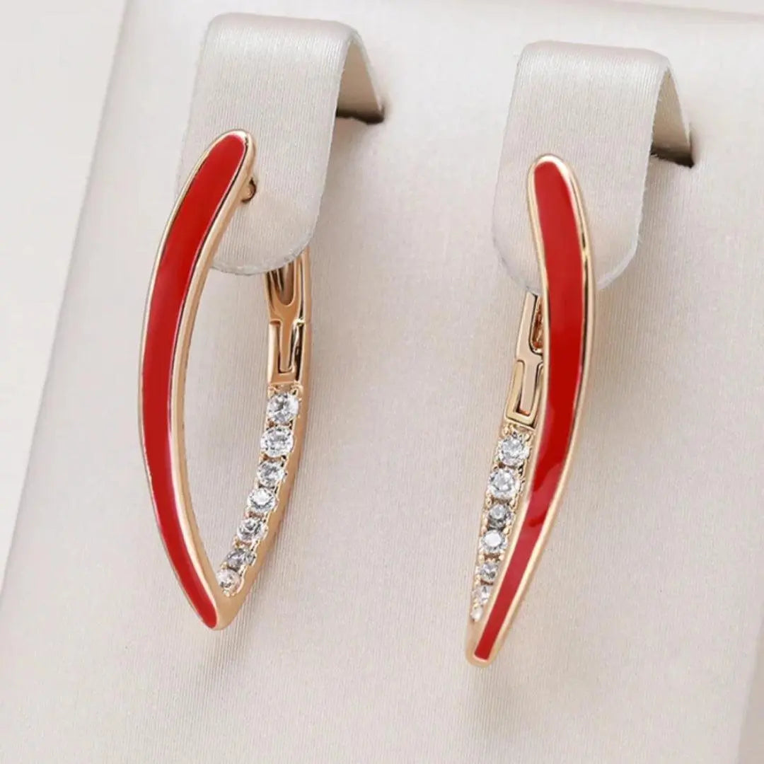 Elegant earrings with red enamel