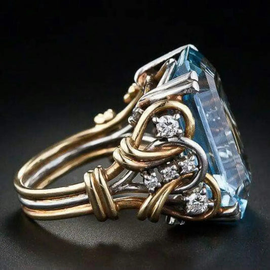 Vintage blue zirconia layered golden ring