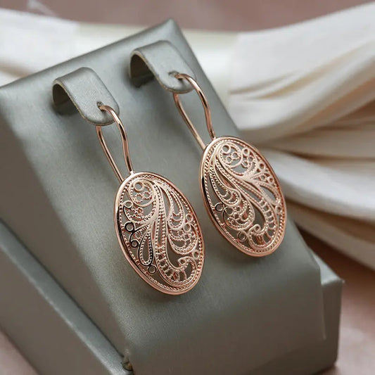 Elegant shiny earrings in golden