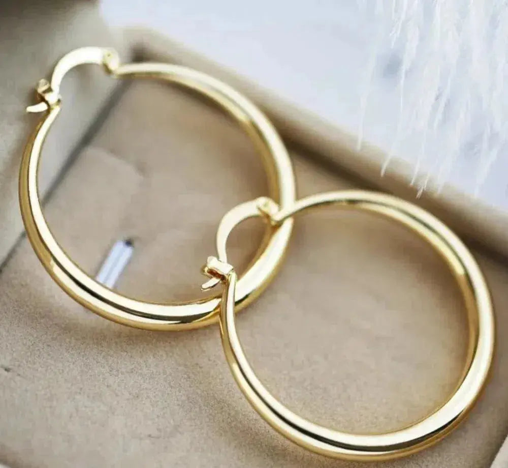 Large hoop earrings in golden